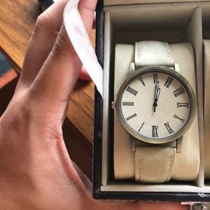 Unbranded cream watch with cream strap